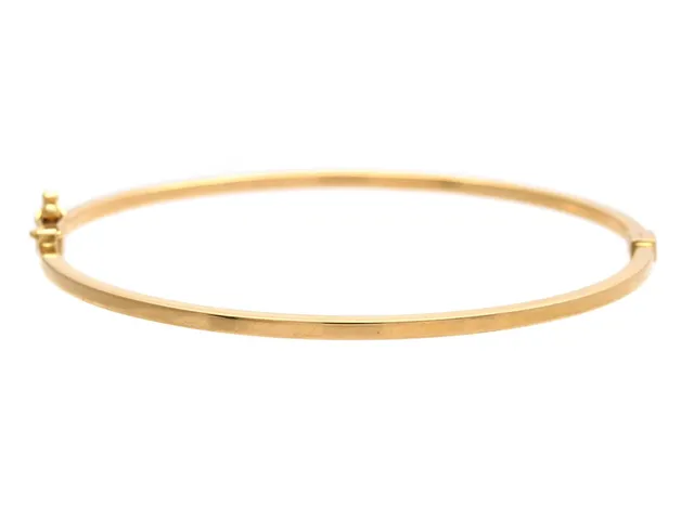 ARMRING, 18K guld, innermått 60 x54 mm, vikt 3,4 g.