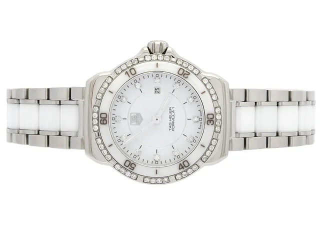 TAG HEUER, Formula 1, Serie nr. RPG9907, Ref nr. WAH1313.BA0868, Boett nr. WAH1313, damur, 31 mm, stål/ceramic, quartz, safirglas, datum, briljanturtavla (12 st. W/P, ca 0,09 ctv), briljantkrans (48 st. W/P, ca 0,35 ctv), originallänk, viklås, Ref nr. BA0868-Y-P8, cert, december 2012, box, ytterkartong.