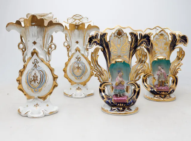 Two pairs of French Napoleon III porcelain vases.