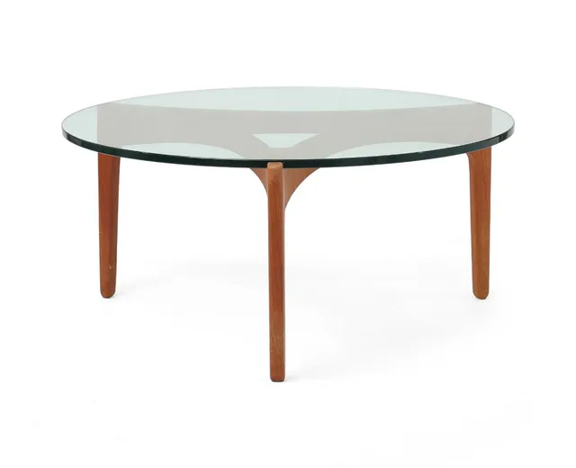 Circular coffee table with teak frame and glass top. Model 104. Manufactured and marked by Chr. Linnebergs Møbelfabrik, Odder. H. 46 cm. Diam. 100 cm.