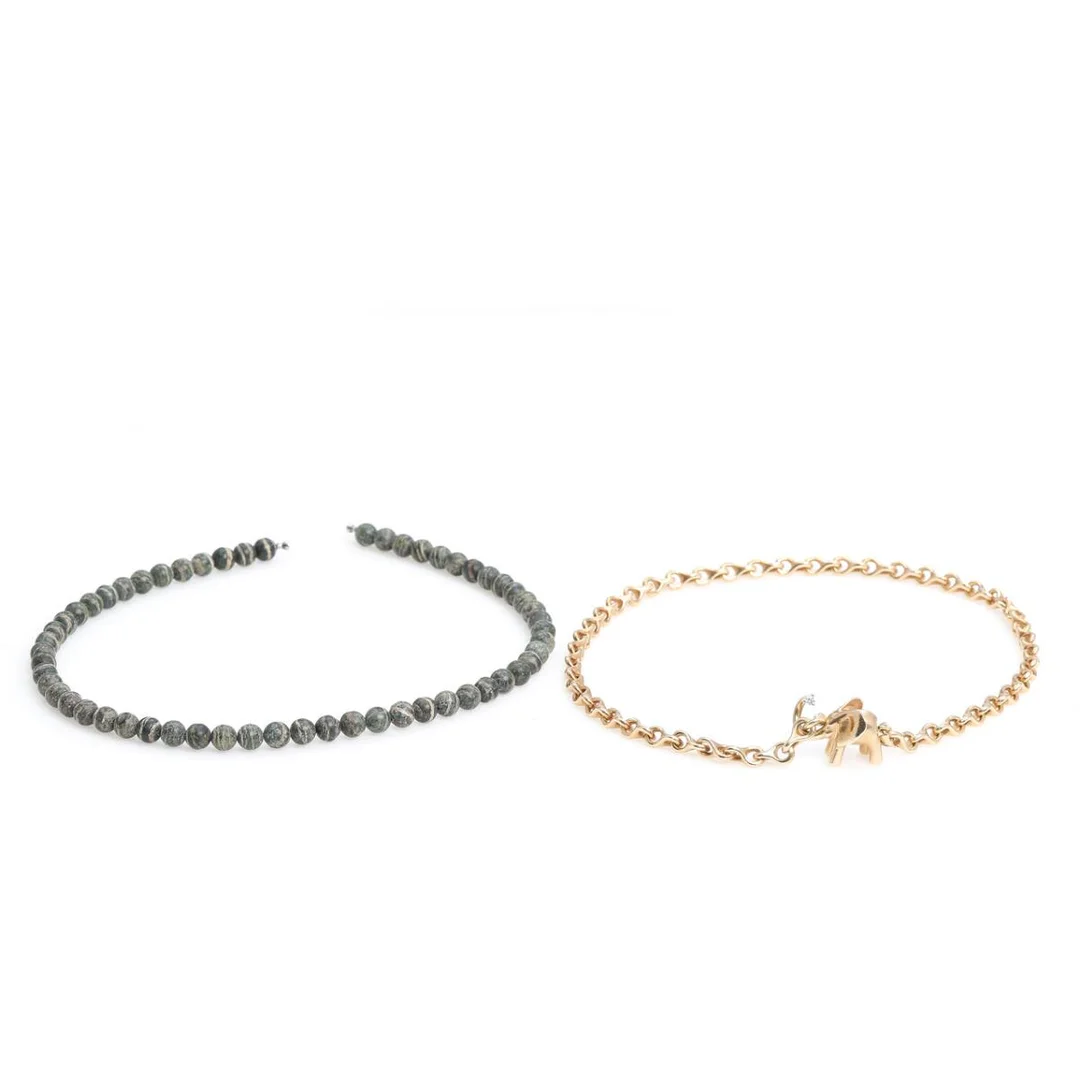 Ole Lynggaard: A necklace with a clasp in the shape of an elephant with a brilliant-cut diamond weighing app. 0.10 ct., mounted in 14k gold. G/VS. L. app. 46 cm — Jewellery/Necklaces & pendants — Bruun Rasmussen