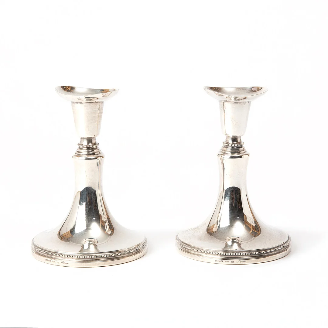 ERIC LÖFMAN. Ljusstakar, ett par, silver, 1974. — Candlesticks — Stockholms Auktionsverk Göteborg