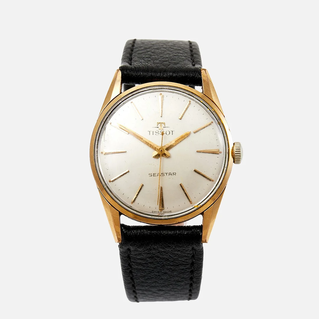 TISSOT, Seastar, (Swiss Made), guld på stål, ca 32 mm, ca 1963. — Wristwatches — Stockholms Auktionsverk Sickla