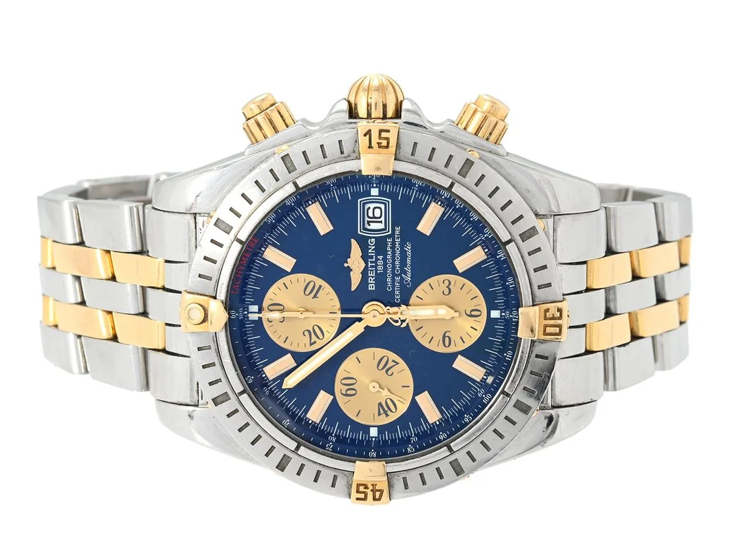 BREITLING, Chronomat Evolution, "Tachymetre", Chronometre, Cal 13 (ETA 7750), Verk nr. 2199116, Serie nr. 2199116 , Ref nr. B13356, Boett nr. 0507B4, kronograf, herrur, 43,7 mm, bicolour, automatisk, safirglas (se fördjupad info), datum, servicebehov, Pilotlänk (stål/guld), viklås, Ref nr. S2107/357D, ca 2007. — Klockor/Breitling — Kaplans