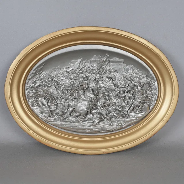 CHARLES III THE VICTORIOUS, A GILDED AND SILVERED OVAL PLAQUE.