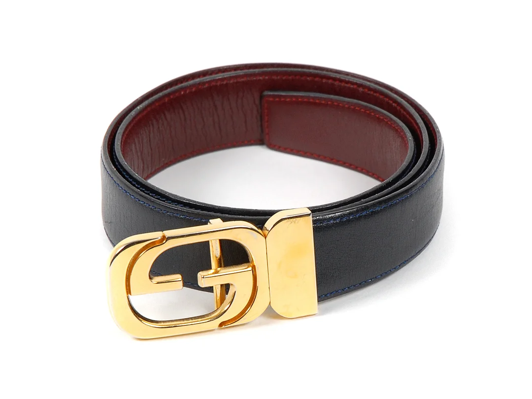 SKÄRP, GUCCI vändbart marin/vinröd gulmetallspänne bredd 3 cm längd 75-80 cm — Accessoarer/Bälten — Kaplans