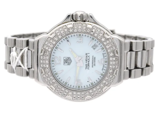 TAG HEUER, Formula 1 Lady, Professional, i stål, quartz, safirglas, 200 Meter, Serie nr. REA2230 Boett nr. WAC1215-0, damur, 36 mm, med box och extra länkar, med datum och diamantring, batteribyte behövs,