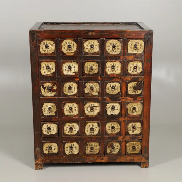 A CHINESE PROVINCIAL APOTHECARY CHEST.