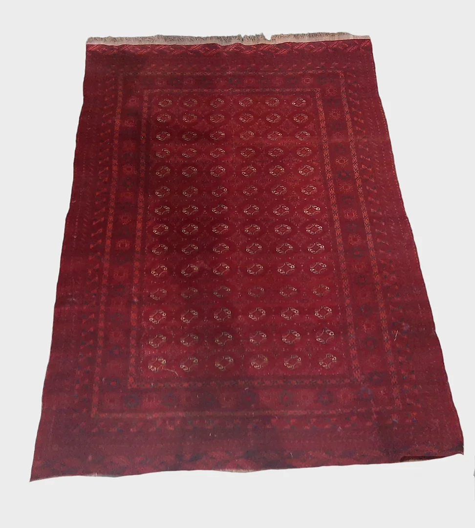 A LARGE TEKKE TURKOMAN WOOL CARPET. — Carpets — Bishop & Miller