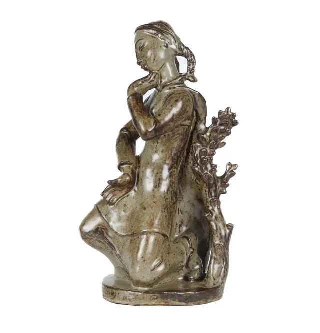 Helge Christoffersen for Royal Copenhagen. Seated woman. Stoneware figure with sung glaze.