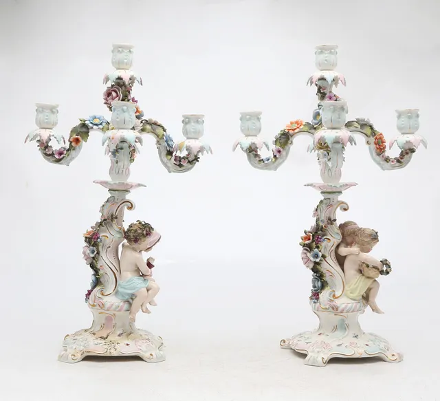 Pair of candelabra in German Sitzendorf porcelain, early 20th Century.