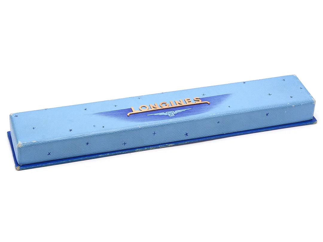 BOX, till Longines damur, blå, 42 x 218 x 19 mm, skadad, ca 1955. — Klocktillbehör/Longines — Kaplans