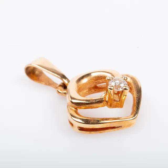 HÄNGE, 18 K guld med briljantslipad diamant.