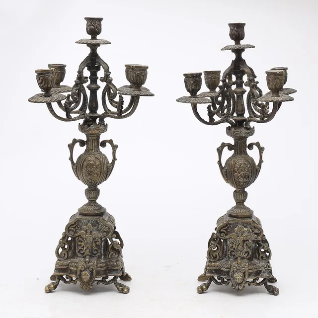 Pair of Napoleon III style candlesticks in brass, 20th Century.