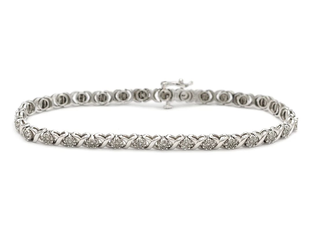 ARMBAND, 18K vitguld, 279 åttkantslipade diamanter ca 1,10 ctv, ca W/VS-SI, längd 19,5 cm, vikt 12,2 g. — Smycken/Armband — Kaplans