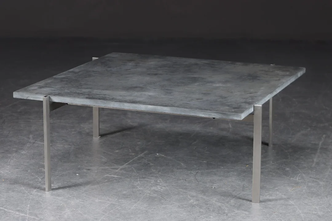 Poul Kjærholm. Coffee table with slate top, model 'PK61' — Furniture/Coffee tables, occasional tables — Lauritz