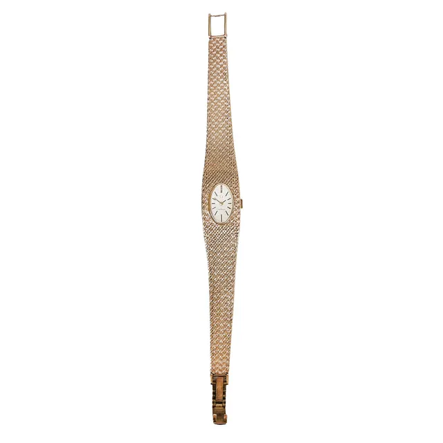 AN OMEGA 9 CARAT GOLD LADIES WRISTWATCH.