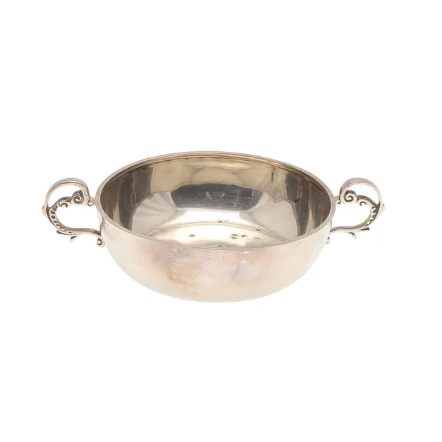 A GEORGE V SILVER PORRINGER.