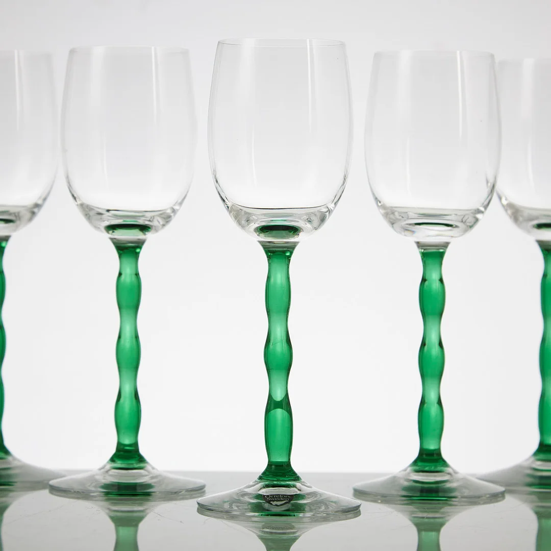 GUNNAR CYRÉN. "Nobel", vitvinsglas, 12 st, Orrefors, undertill märkta, etikettmärkning. — Utility glass — Stockholms Auktionsverk Magasin 5