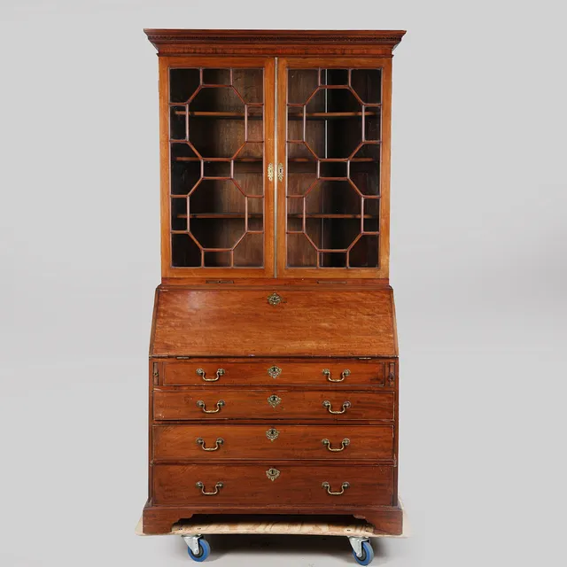 A GEORGE III MAHOGANY BUREAU BOOKCASE.