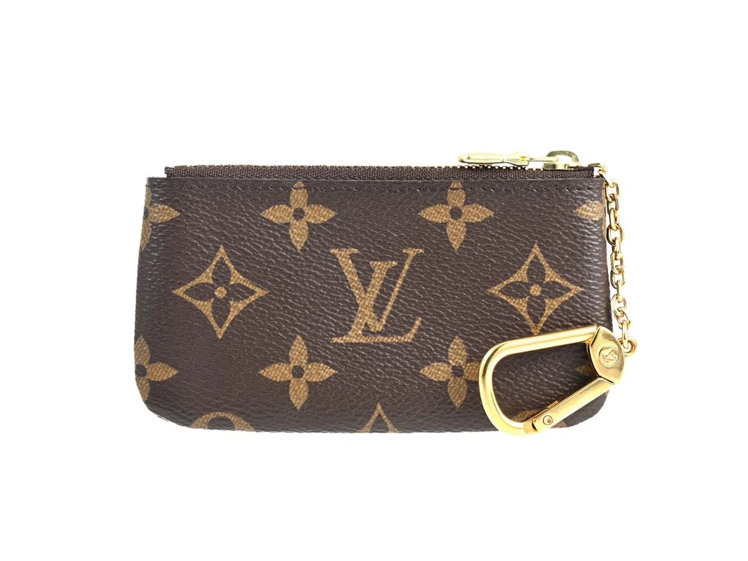NYCKELHÅLLARE, LOUIS VUITTON, monogram canvas, guldfärgade beslag, 12,5x6 cm, märkt CT2201, år 2021, dustbag. — Accessoarer/Nyckelringar — Kaplans