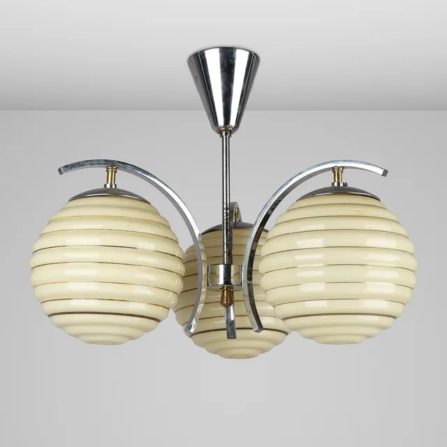 BENT KARLBY. Ceiling lamp in Bauhaus style, chrome-plated metal with brass details and champagne-colored glass shades, variant of model K618, LYFA, Denmark, 1930s/40s.
