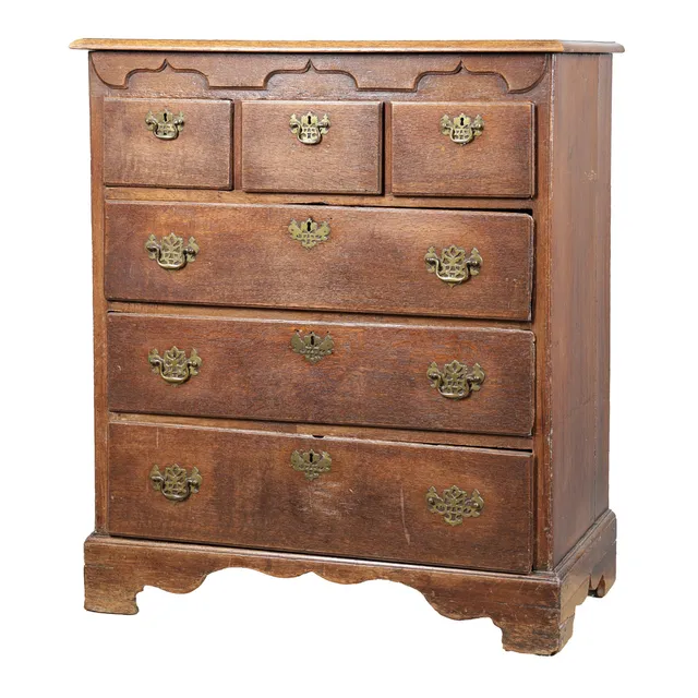 A GEORGE III OAK NORFOLK CHEST OF DRAWERS, CIRCA 1760-80.