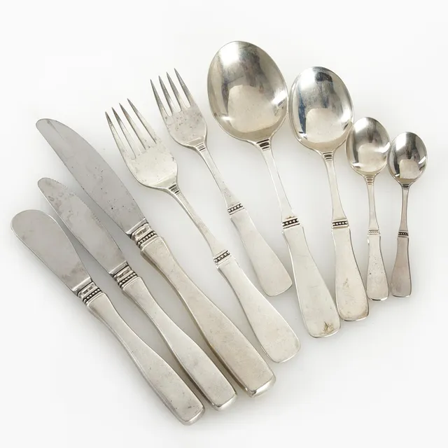 ERIC LÖFMAN. "Uppsala", bestickuppsättning, 107 dlr, silver, MGAB, varierande årsindex.
