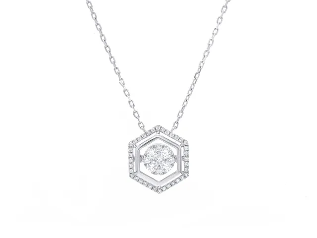COLLIER, 18K vitguld, briljantslipade diamanter ca 0,70 ctv, ca TW-TCr/SI, kedja 42 cm, vikt 4,1 g.