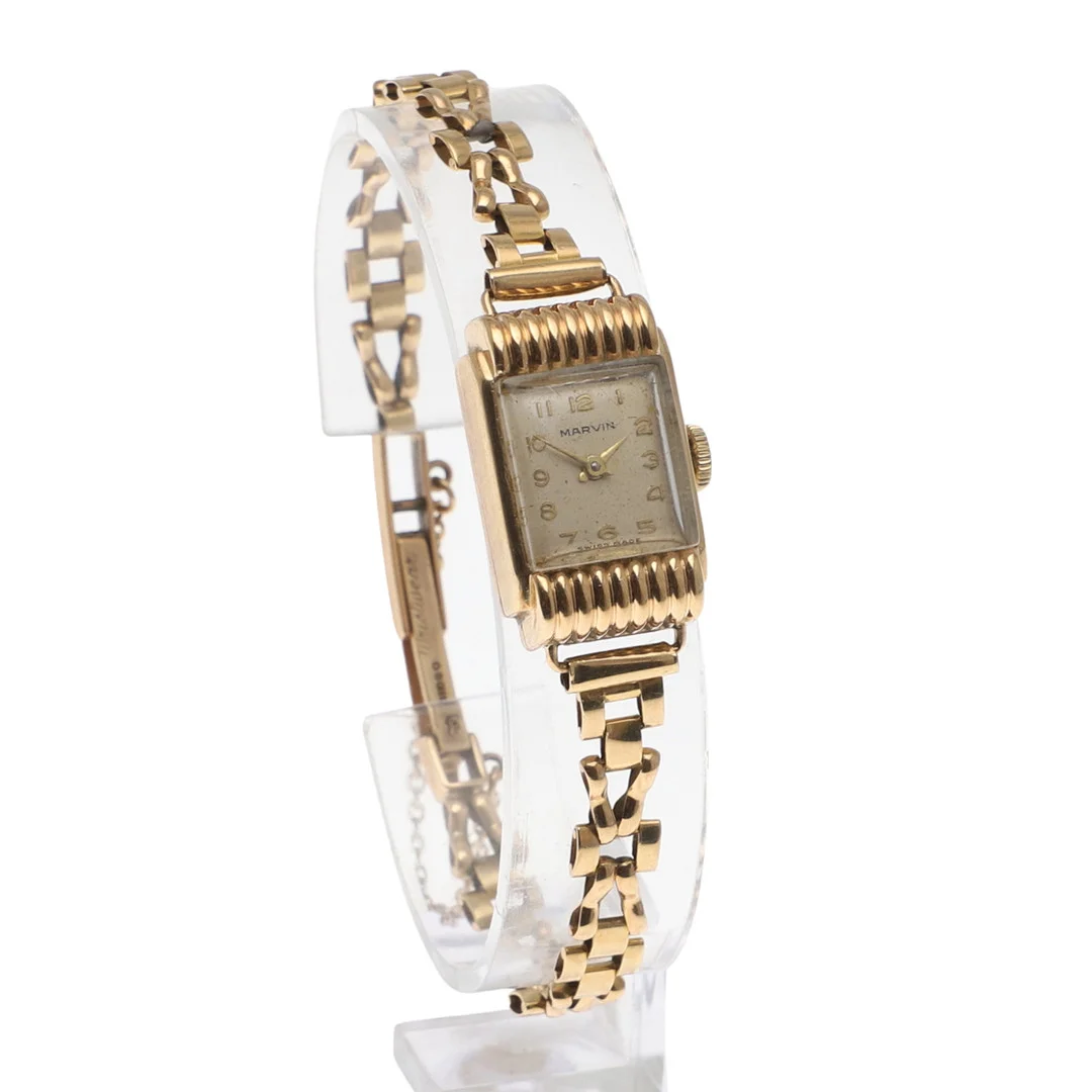 A LADY'S 9CT GOLD WRISTWATCH BY MARVIN. — Wristwatches — Lawrences Auctioneers