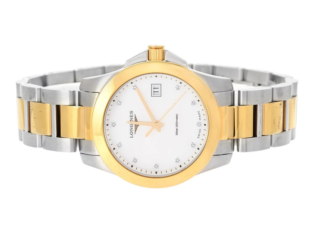 LONGINES, Conquest (30bar/300meter), Cal 156, Serie nr. 50867666, Ref nr. L3.377.3.87.7, Boett nr. L3.377.3, damur, 34 mm, bicolour, quartz, safirglas, datum, pärlemorurtavla med diamanter (11 st. 8/8), originallänk, viklås, Ref nr. L600157164W, cert, september 2025, box, ytterkartong. — Klockor/Longines — Kaplans