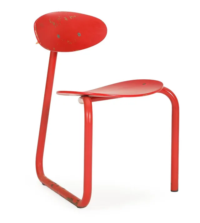 Erik Magnussen: “Yoga”. Chair with red lacquered metal frame and red lacquered moulded and laminated seat and back. Manufactured by Kevi.