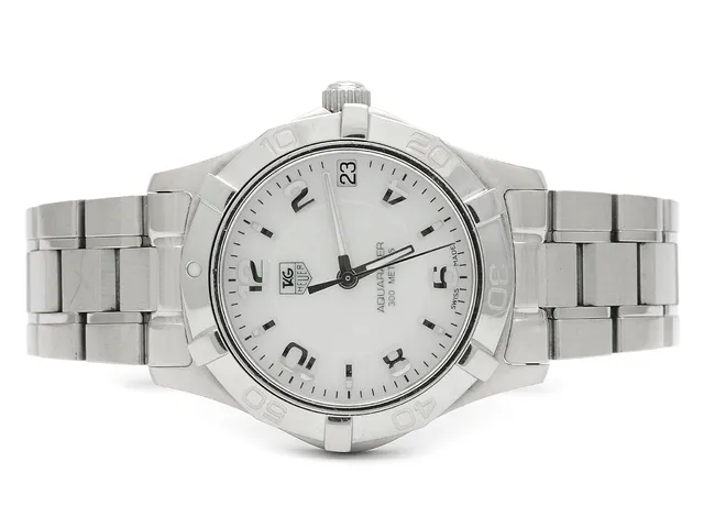 TAG HEUER, Aquaracer (300 Meters), Serie nr. EAB1221, Ref nr. WAF1311.BA0817, damur, 32 mm, stål, quartz, safirglas, datum, pärlemorurtavla, originallänk, viklås, Ref nr. FAA035-G-B9/3128 -G, cert, augusti 2013, box, ytterkartong.
