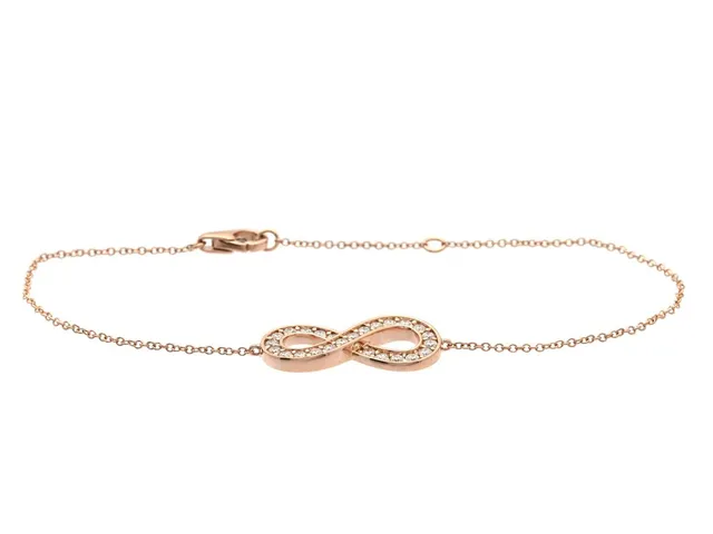 ARMBAND, 18K roséguld, 25 briljantslipade diamanter ca 0,44 ctv, ca W-Cr/VVS-VS, evighetssymbol, längd 16/18 cm, vikt 3,2 g.