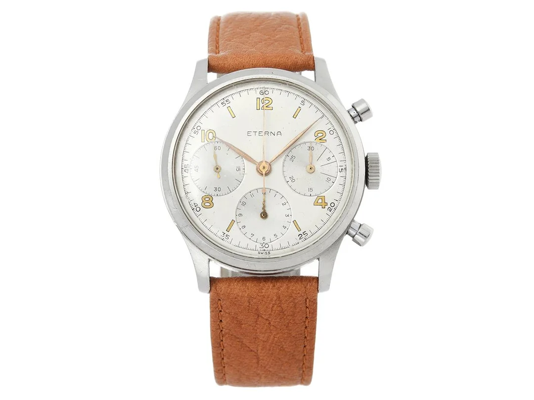 ETERNA, "Oversized", "Swiss", Cal 704 R (Valjoux 71), Serie nr. 3213465, Boett nr. 3259148, kronograf, herrur, 38 mm, stål (Staybrite), manuell, plexiglas, läderband, ca 1946. — Klockor/Eterna — Kaplans