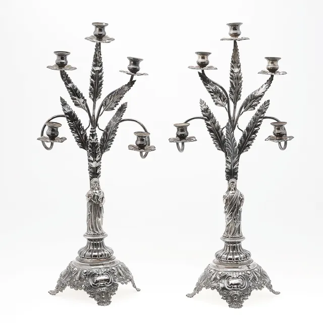Pair of Elizabethan silver candelabra, circa 1850-1865.