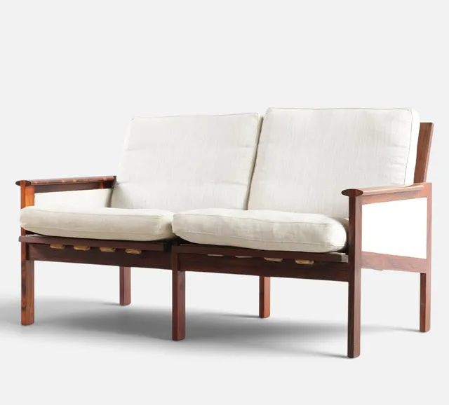 ILLUM WIKKELSO. “Capella”, fritstående to-pers. sofa med stel af palisander, sider samt løse hynder betrukket med uld. Formgivet i 1959. Udført hos N. Eilersen. Danmark, 1960-70'erne.