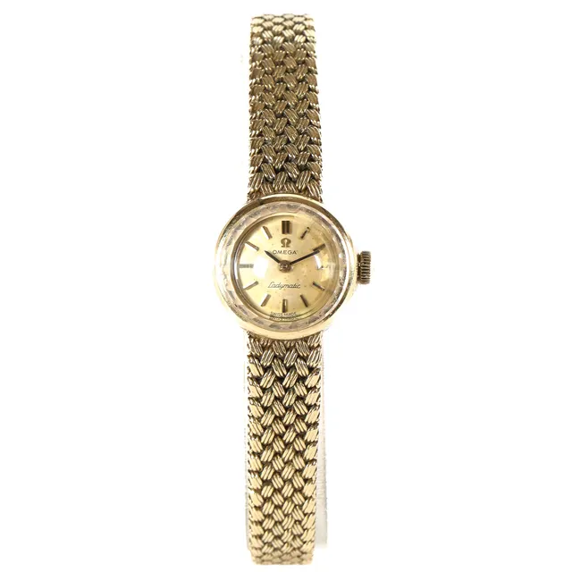 Omega Ladymatic, ladies' watch made of 14 kt gold.