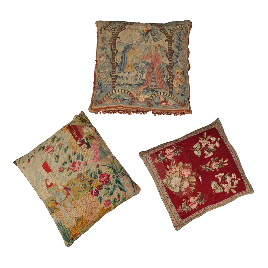 THREE 17TH CENTURY AND LATER CUSHIONS (3). — Textiles — Bishop & Miller