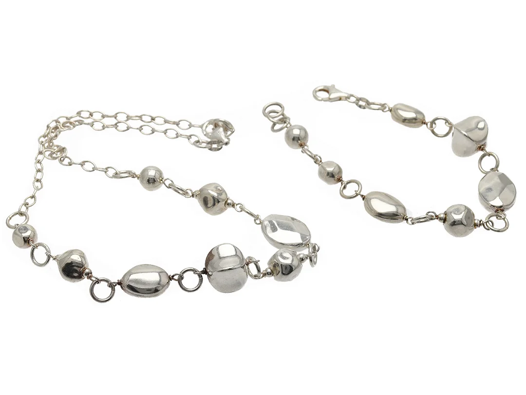 SMYCKESET, collier och armband, sterlingsilver, längd 44 och 20 cm, vikt 30,6 g. — Smycken/Smyckeset — Kaplans