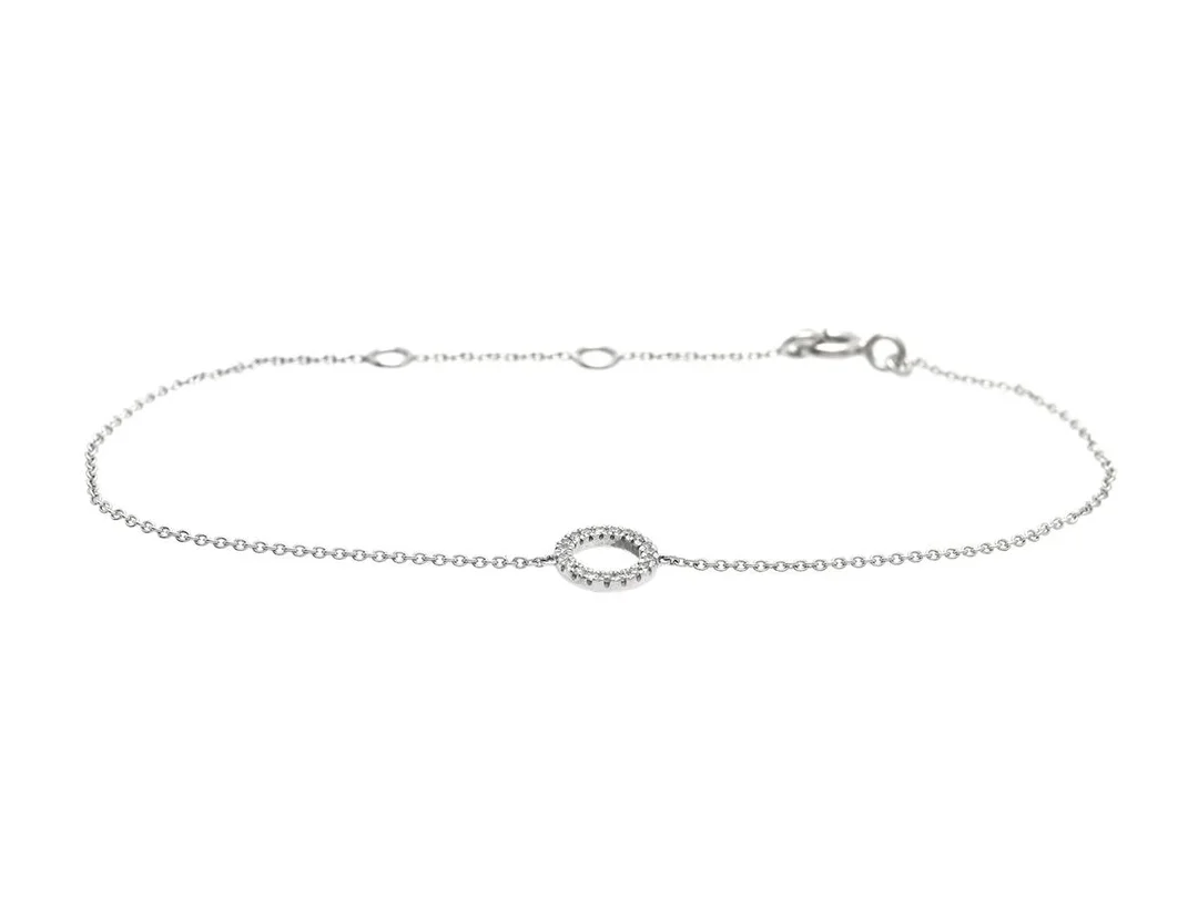 ARMBAND, 18K vitguld, briljantslipade diamanter ca 0,10 ctv, ca W/P, längd 14,5-17,5 cm, vikt 1,1 g. — Smycken/Armband — Kaplans