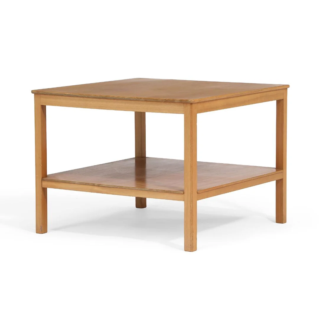 Square coffee table in solid mahogany. Made and marked by Rud. Rasmussens Snedkerier. H. 54 cm. L./W. 71 cm. — Modern Furniture — Bruun Rasmussen