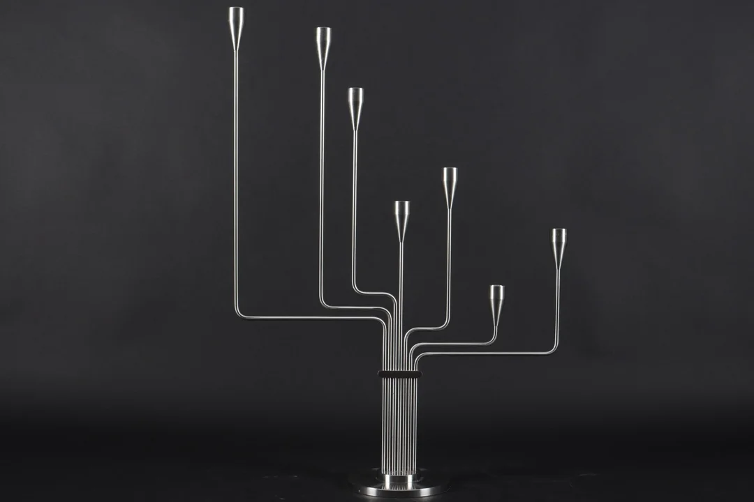 Piet Hein. Karlsvognen kandelaber / stage — Silver, bronze, copper and pewter/Silver candlesticks — Lauritz