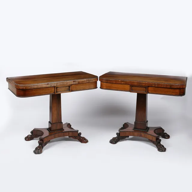 A GOOD PAIR OF LATE REGENCY ROSEWOOD CARD TABLES IN THE MANNER OF GILLOWS.