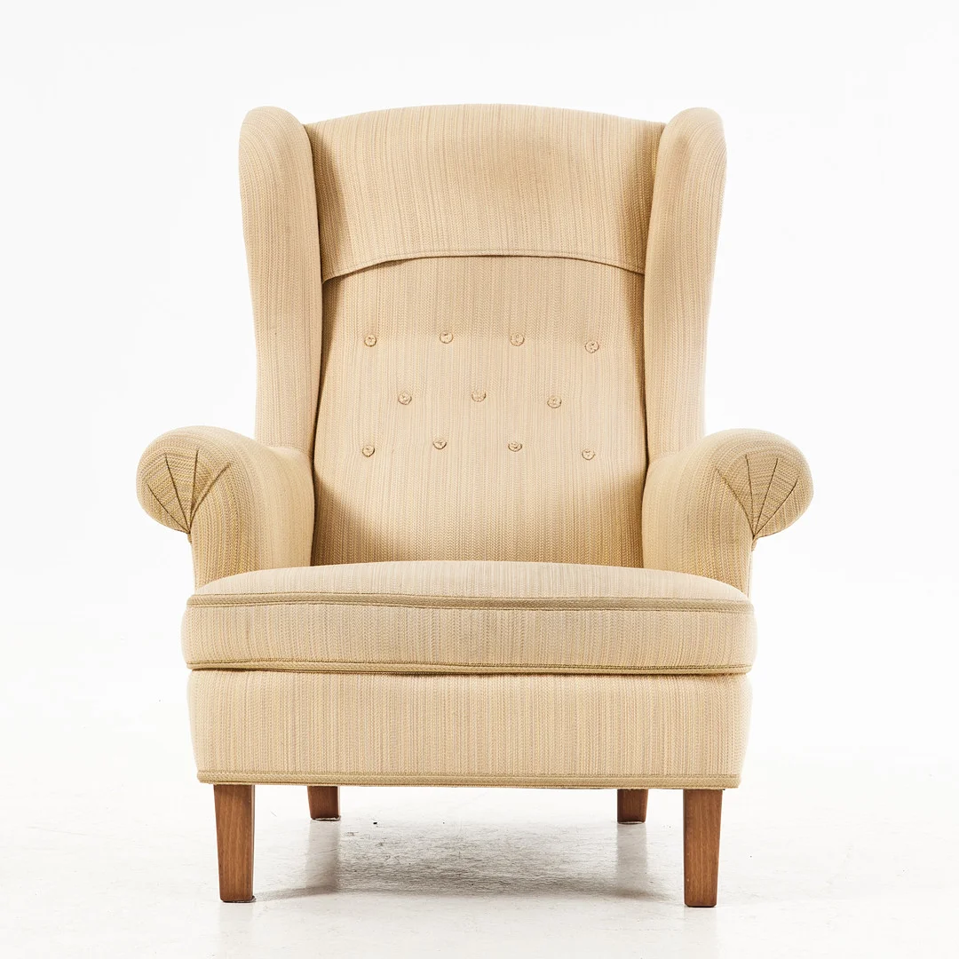 CARL MALMSTEN. "Häggbom", fåtölj, OH Sjögren, ben i bok, klädsel i gul textil. — Armchairs & Chairs — Stockholms Auktionsverk Magasin 5