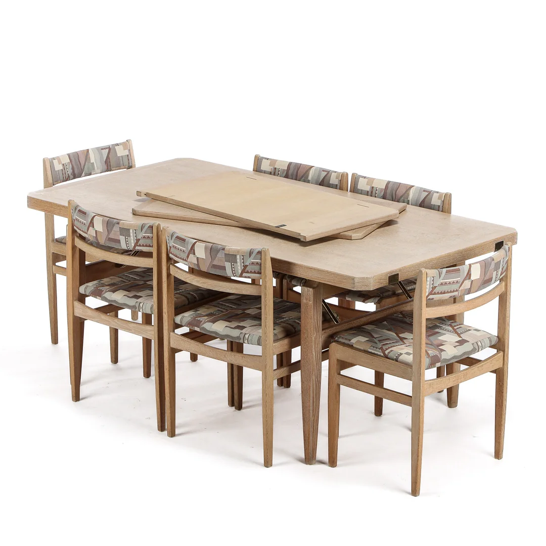 Henry Kjærnulf. Dining table and six chairs made of oak (7) — Furniture/Dining tables, dining room furniture — Lauritz