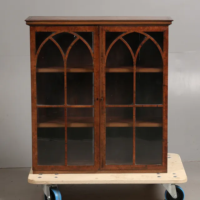 A GEORGE III STYLE MAHOGANY CABINET.