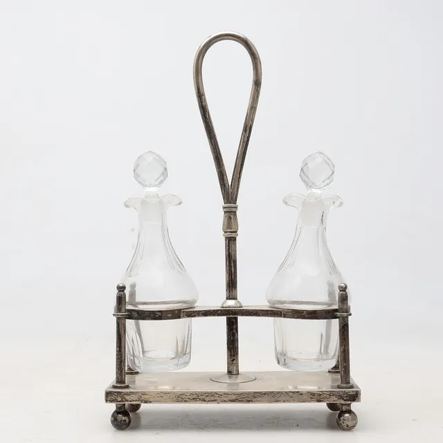 Silver cruets stand by Cabot jewellers, first third of the 20th Century.