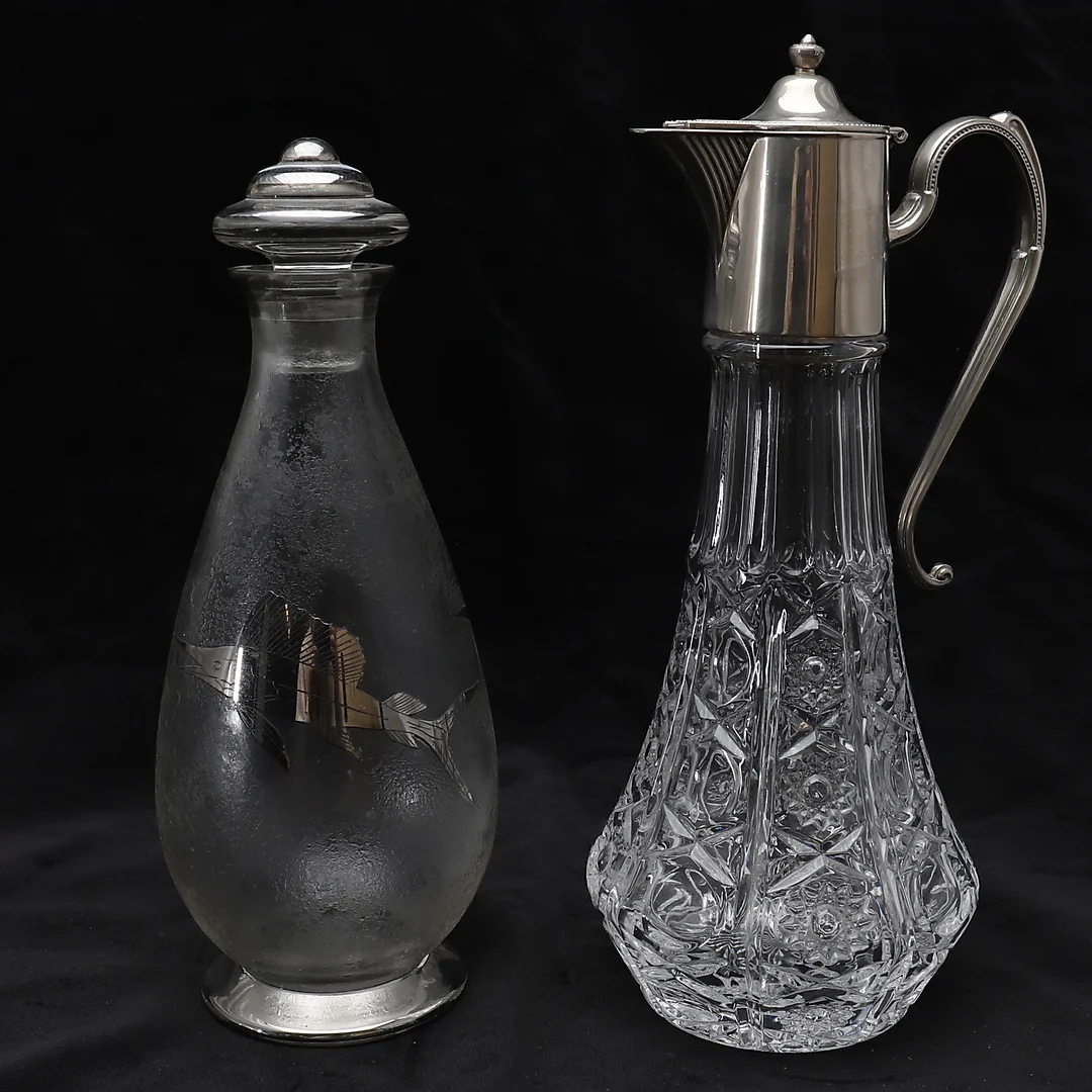 A PEWTER MOUNTED CLARET JUG. — Tableware — Dreweatts Online