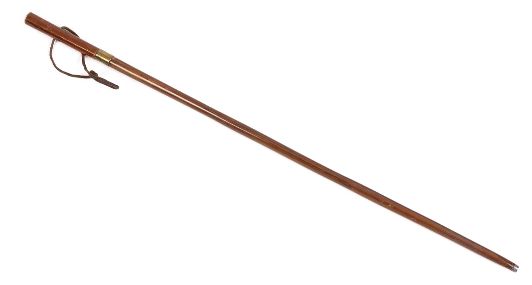 A 19TH CENTURY WALKING CANE SWORD STICK. — Edged weapons — Griffin’s Auctioneers